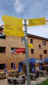 Trail signpost at summit station Flums-Kleinberg