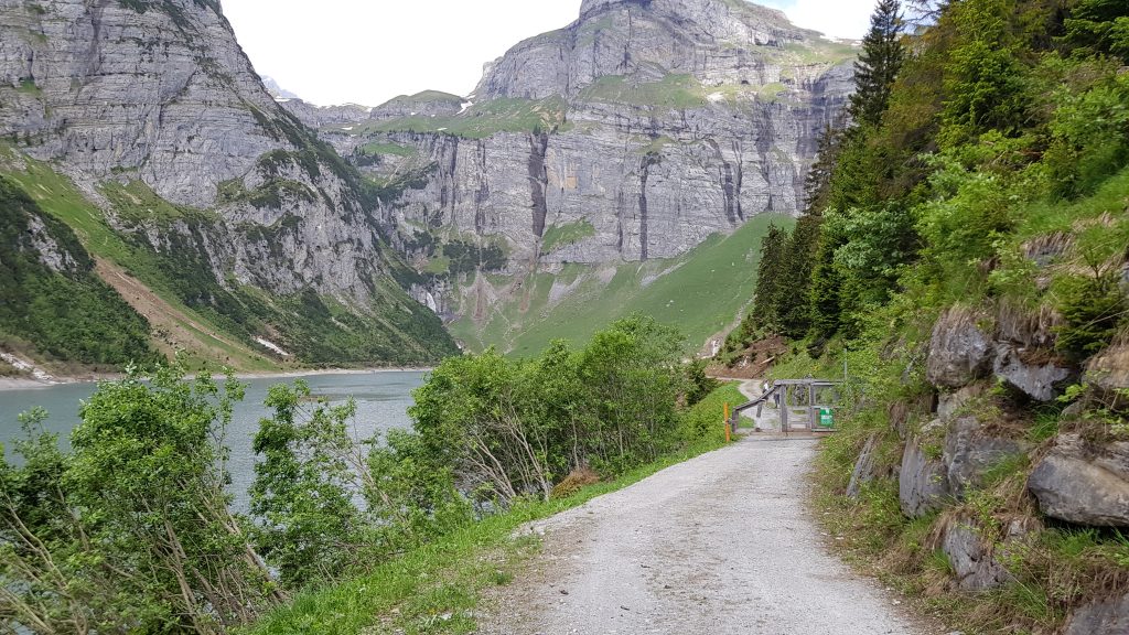 The gate blocking the track along the lake
