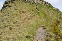 The trail climbing along the ridge towards Guscha