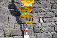 The hiking signpost in the center of Andiast