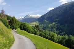 The trail opens out into the rolling meadows that cover the sides of the valley